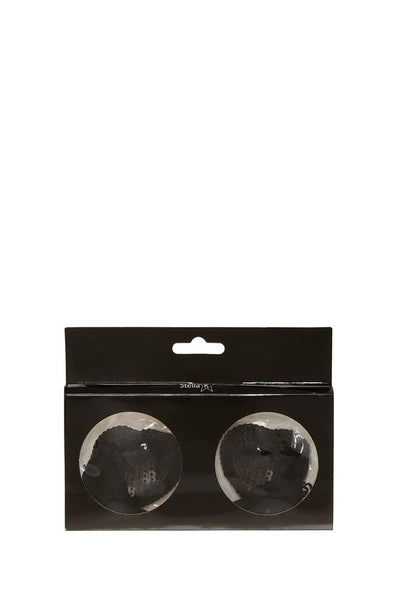pair black sequin covered heart-shaped silicone pasties with black tassels, shown on windowed black packaging