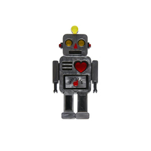 toy grey metal robot with red heart and yellow eyes 2 1/4" layered resin brooch