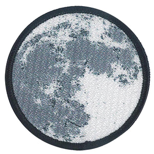 "Photo-realistic" patch of the full moon with black stitched outline as viewed from Earth 