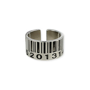 shiny silver metal ring with a barcode design etched onto the outside