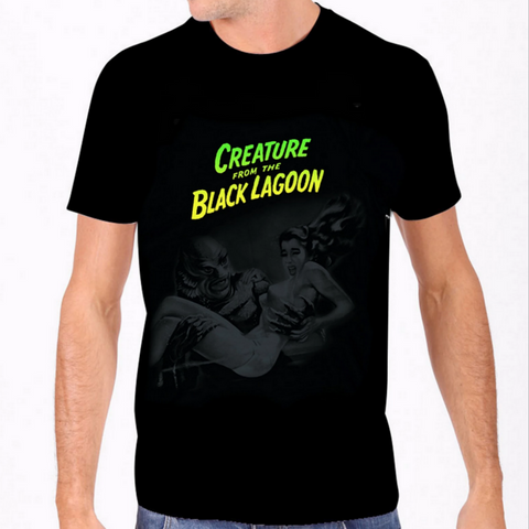 men's 100% cotton fitted black t-shirt featuring grey scale movie poster image from the 1954 classic the Creature From The Black Lagoon with vibrant green and yellow title letters, shown on model