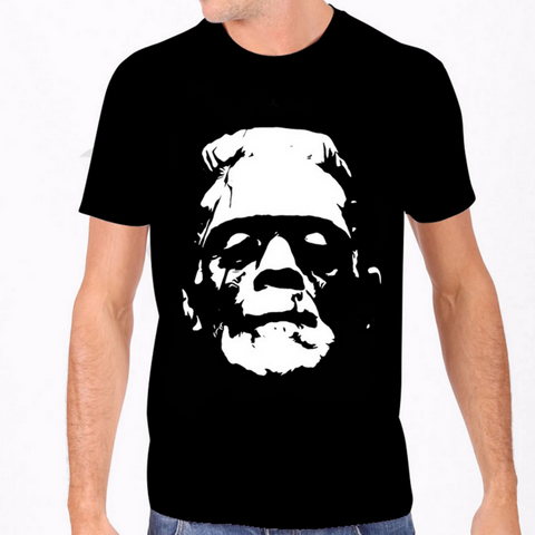 Men's 100% Cotton fitted black t-shirt featuring large stark white head only image of Boris Karloff in his iconic role as the monster from the classic 1931 movie, Frankenstein, shown on model