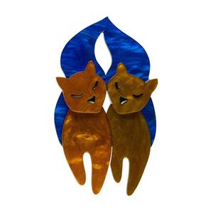 pair of golden brown kitties with blue tails layered resin brooch