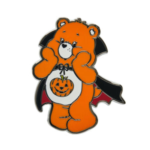 Care Bears Collection "Trick-Or-Sweet Bear" standing orange bear wearing black cape, white belly with jack-o'-lantern design enameled silver metal clutch back pin