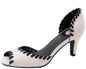 cream peep toe heels with black riveted eyelets with satin ribbon woven through