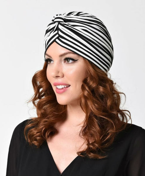 vintage-inspired knotted turban in black & white stripes, shown on model