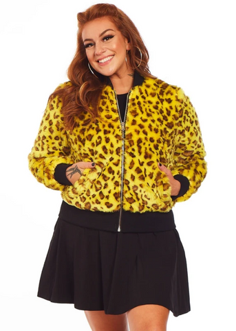 bright neon yellow leopard print faux fur bomber style jacket featuring zip closure, satin lining, black stretch rib at the collar, cuffs, and hem, and front slash hand pockets. shown on model