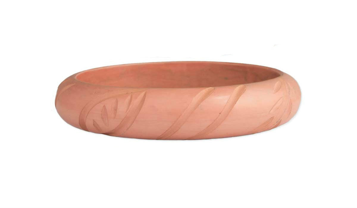 5/8" wide carved leaf pattern resin bangle in pale peach-y pink