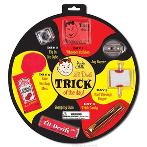 "trick of the day" 7 classic gags blister card packaged together: whoopee cushion, joy buzzer, nail thru finger, trick candy, snapping gum, fake ketchup, and fly in ice cube