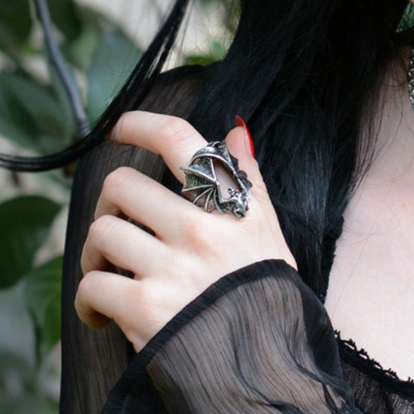 "Stealth" antiqued pewter 1 1/4" open-winged creeping bat ring, shown worn by model