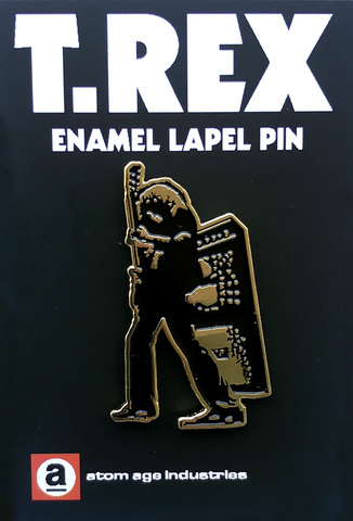 Gold metal with black enamel T. Rex "Electric Warrior" lapel pin, shown on illustrated black backer card packaging