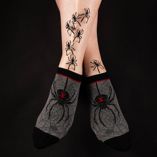 Black Widow Spider and webs design on soft stretch cotton blend ankle socks, shown on model