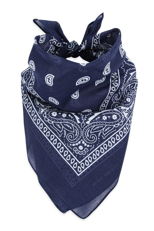 100% Cotton 20" square classic bandana in navy blue with white paisley print, shown folded diagonally and tied to be worn bandit style