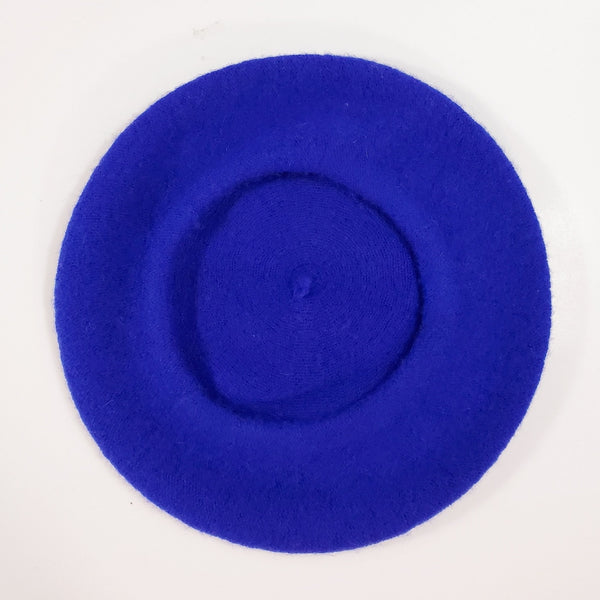 11" diameter "French" style wool blend knit beret in bright electric royal blue, showing interior