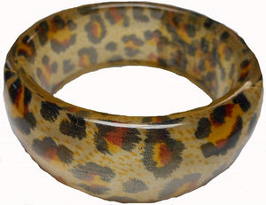 leopard print fabric encased in 1 3/8" wide sturdy clear acrylic bangle