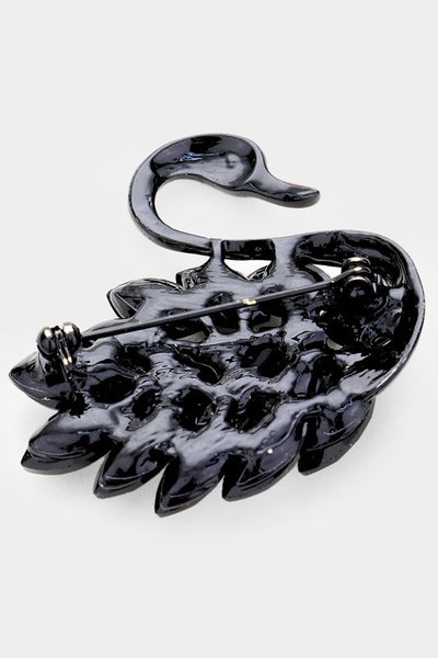 shiny black jewel and black enameled metal swan shaped brooch, showing back view