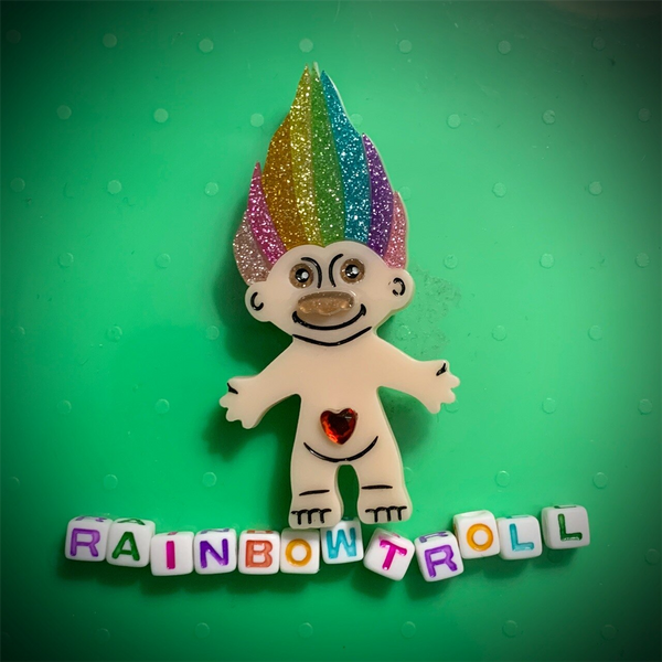 "Rainbow Troll" layered laser cut resin brooch with jewel belly button desoration