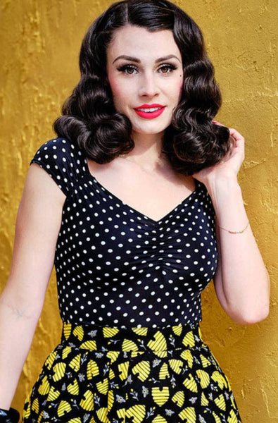 fitted black & white polka dot print top in stretch knit cap sleeves sweetheart neckline, shown on model