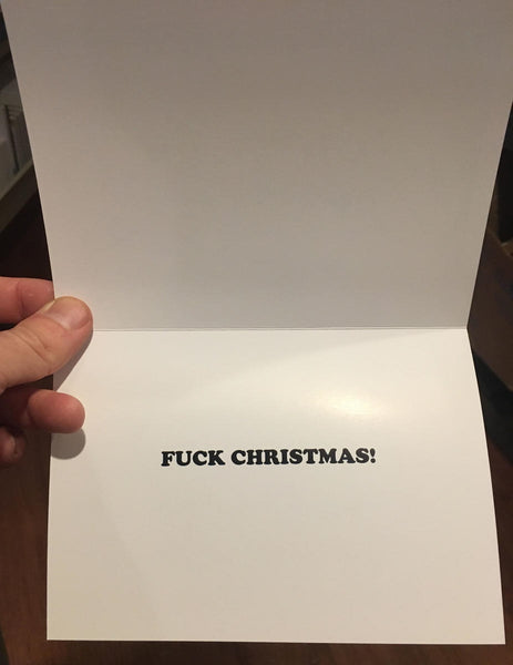 "FUCK CHRISTMAS!" interior greeting in black text