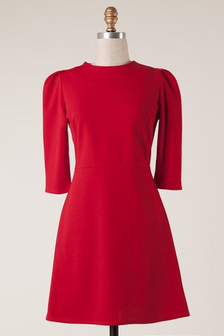 red mini dress with 1/2 length puff shoulder sleeves in a thick stretchy knit, with darted bust, jewel neckline, and a-line silhouette