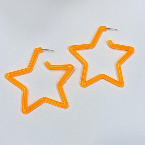 pair neon orange 2 3/4" translucent acrylic star shaped earrings