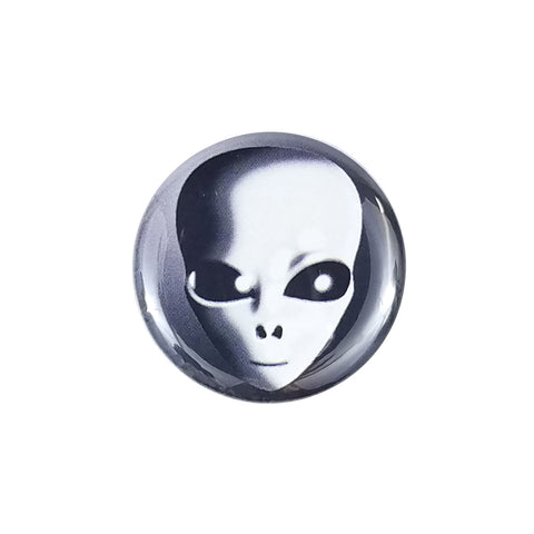 Black and white image of a classic "Grey" alien on a 1.5" round metal button