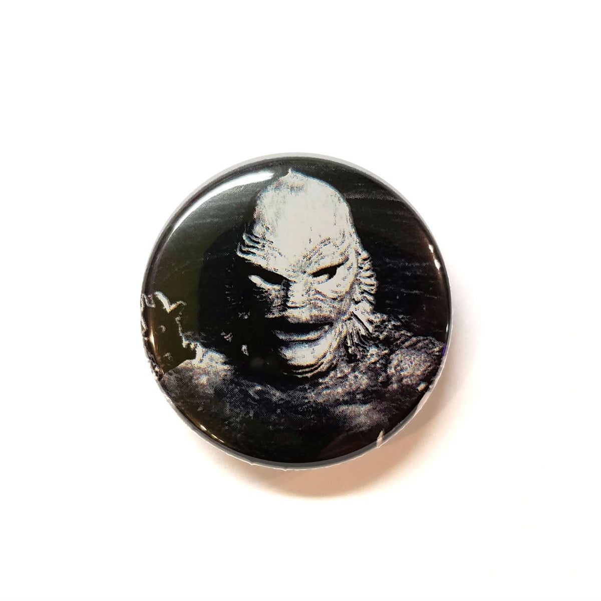 black and white photo portrait image of the Creature from the Black Lagoon monster movie character on 1.5" round metal pinback button