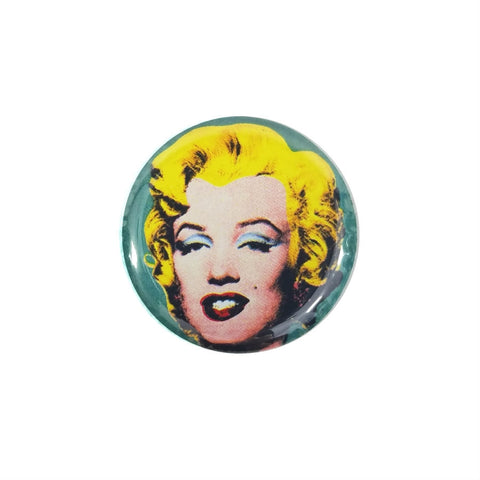 This 1.5" round Andy Warhol Marilyn Monroe button features Andy Warhol's pop art portrait of Marilyn Monroe's face