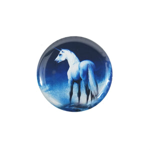 white unicorn against deep blue sky illustrated image on 1.5" round metal pinback button