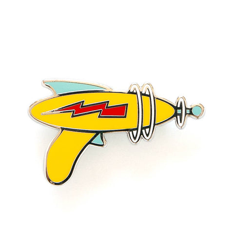 yellow ray gun emblazoned with red electricity bolt enameled silver metal lapel pin