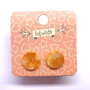 pair 5/8" laser cut circle shaped post earrings in rich marbled orange 100% Acrylic resin