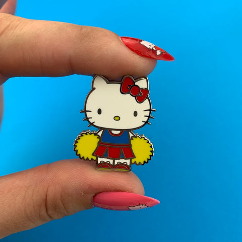 Hello Kitty Collection "Cheerleader" white cat yellow pom-poms enameled silver metal clutch back pin