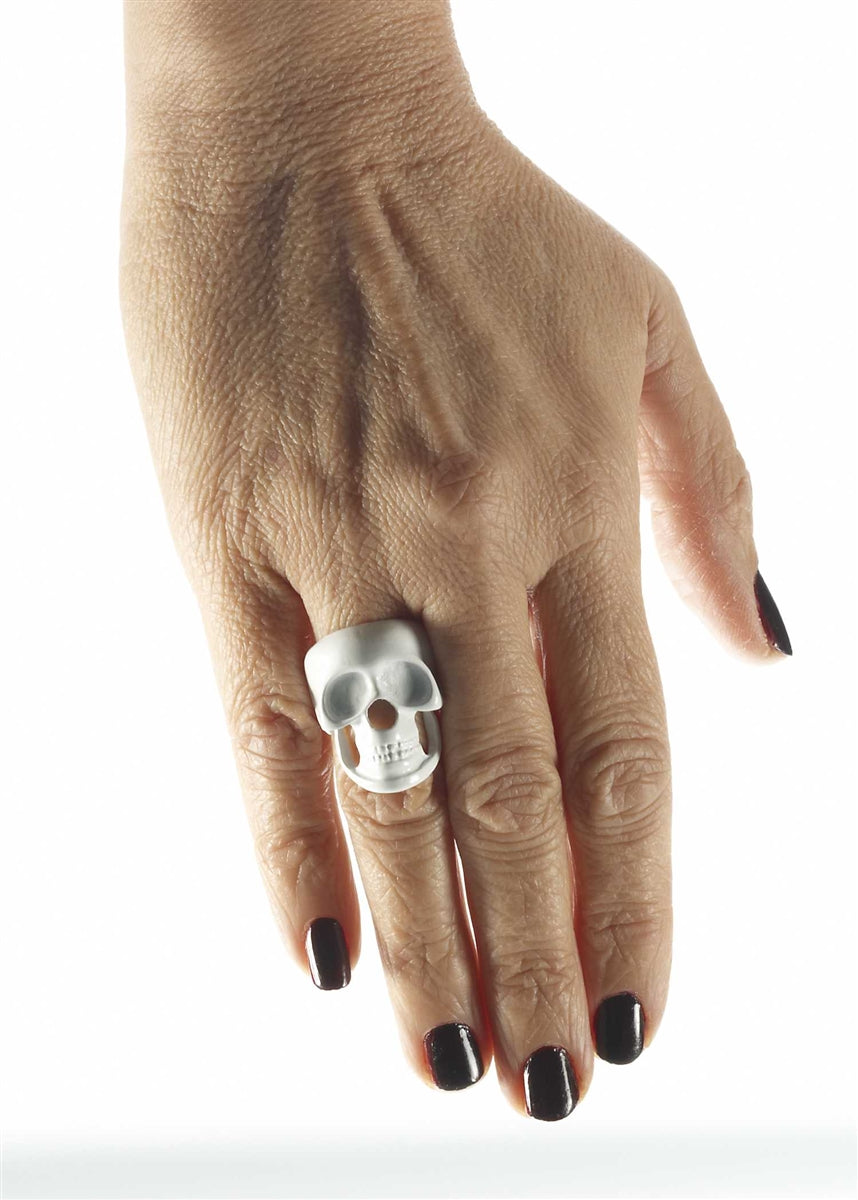 white enameled metal 1" x 1 1/8" skull ring, size 8.5