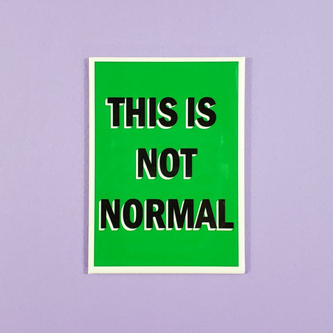 "THIS IS NOT NORMAL" black text on green background 2.5" x 3.5" rectangular refrigerator magnet