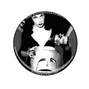 2.25" round metal pin featuring black and white photo of Vampira pouring "ACID" bottle into Jack 'o' Lantern