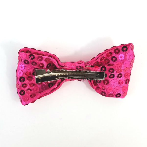 4" x 2" bow hair clip of in hot pink satin with shiny matching color sewn-on sequins and 2 1/8" gator clip fastener, back view