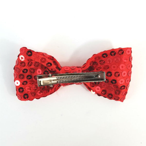 4" x 2" bow hair clip of in red satin with shiny matching color sewn-on sequins and 2 1/8" gator clip fastener, back view