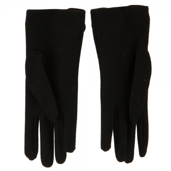 pair of black brushed fiber stretch knit gloves with ornamental black cording button & loop "frog" fastener at the wrist, showing view of reverse