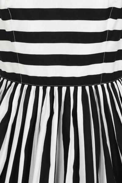 Juno 50s Dress black & white stripe print sweetheart neckline, fitted princess seamed bodice with adjustable black spaghetti straps and gathered just-below-the-knee length skirt, cropped close-up at waist