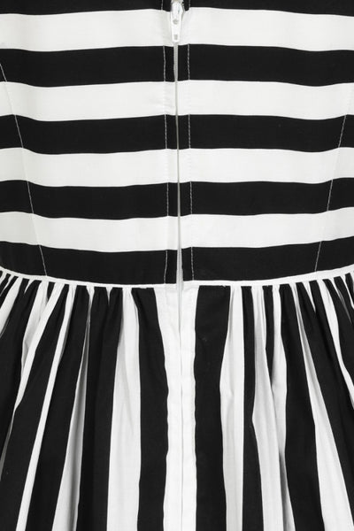 Juno 50s Dress black & white stripe print sweetheart neckline, fitted princess seamed bodice with adjustable black spaghetti straps and gathered just-below-the-knee length skirt, cropped close-up showing back zipper