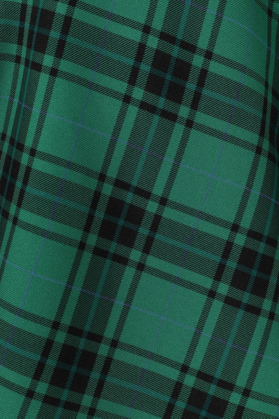green and black plaid fabric swatch close up
