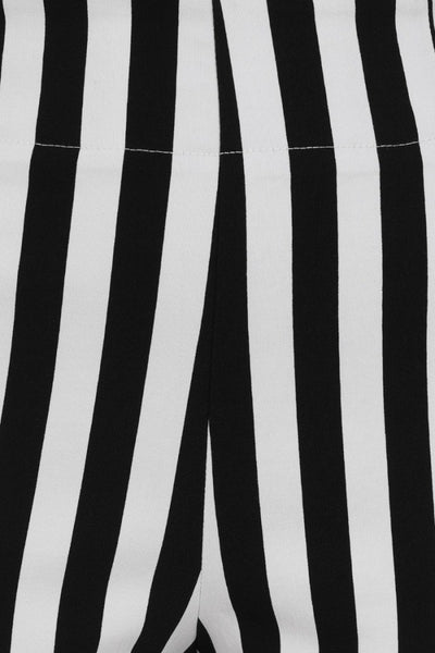 retro high waist fitted stretch capri length pants in vertical black & white stripe print, cropped close-up