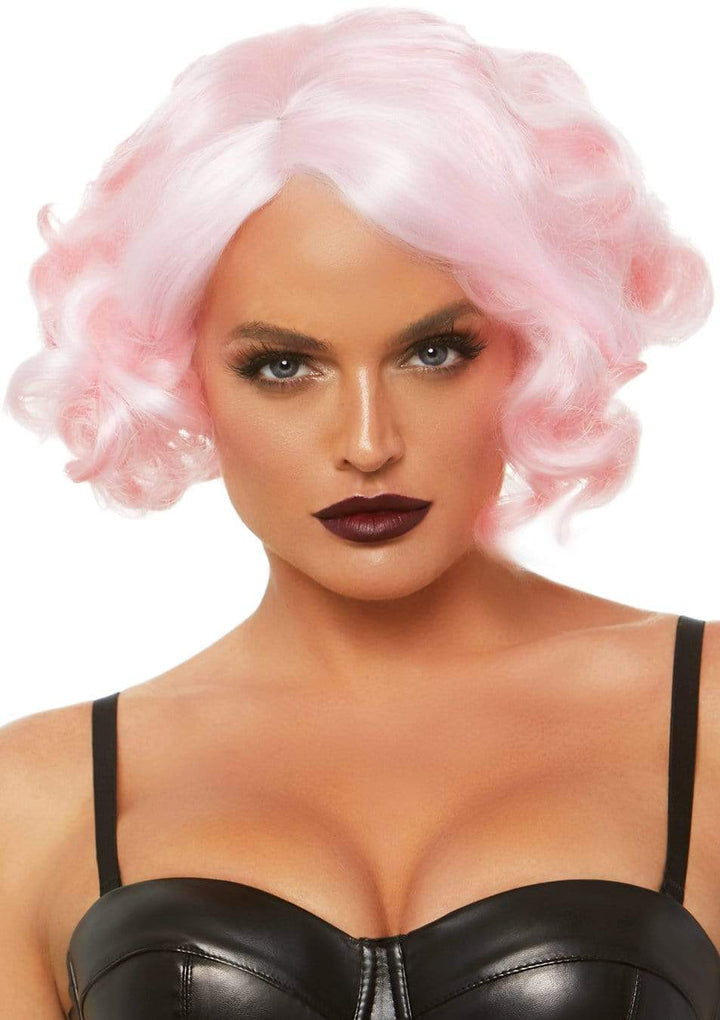 curly pink bob wig shown on model