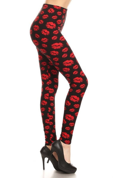 high-waisted brushed fiber stretch knit black leggings with allover red lipstick kiss print, shown side view on model