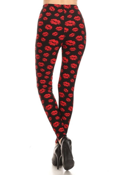 high-waisted brushed fiber stretch knit black leggings with allover red lipstick kiss print, shown back view on model