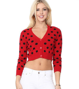 red with black polka dot design 3/4 sleeve v-neck cropped cardigan sweater 3 button closure, shown on model