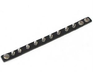 1/2" wide black leather wristband with nine 1/2" silver metal tree spikes and snap closure