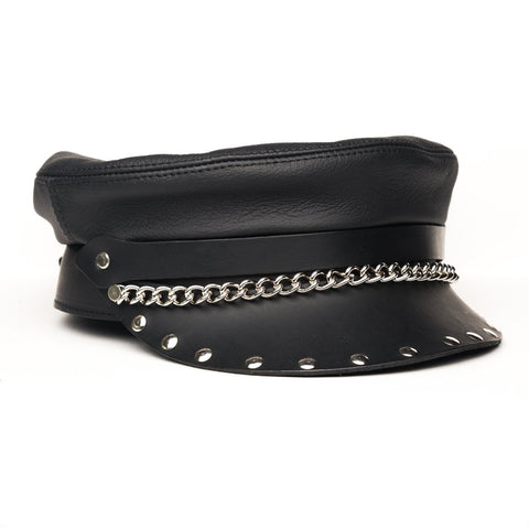 flat top biker cap in soft black leather with chain detail on front of hand and thick and sturdy rivet-studded leather brim