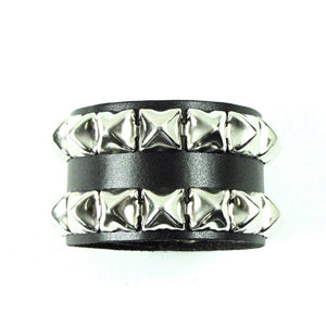 thick black leather 1 5/8" wide adjustable wristband with 2 rows of 1/2" silver metal pyramid studs and heavy duty snap closure