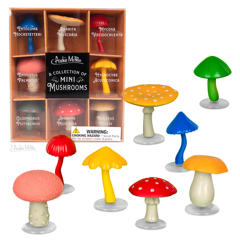 colorful collection of eight different soft vinyl mini mushrooms, pictured with illustrated shadowbox style packaging